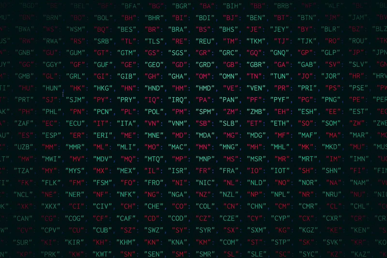 a black background with red and green letters